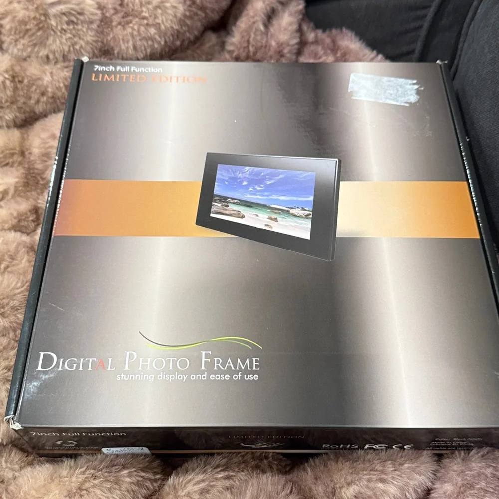 New digital 7” full function black acrylic photo frame with stand -Easy to use.